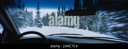 Road viewed from a car, Spray Lakes Road, Kananaskis Country, Alberta, Canada Stock Photo