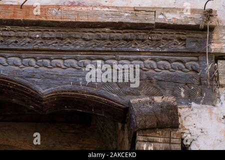 Decrative elements of houses in Kagbeni village, a bridge between Lower and Upper Mustang in the valley of Kali Gandaki river. Nepal. Stock Photo