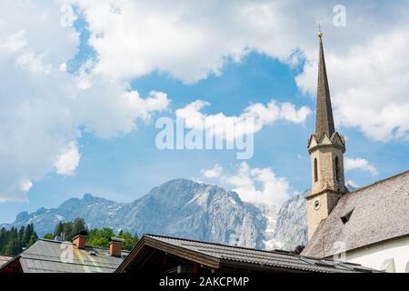 Old alpine church in picturesque mountain town. Stock Photo