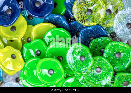 Background of glass petals.Glass Flower . Decoration Background.Multicolored glass round flower petals. Stock Photo