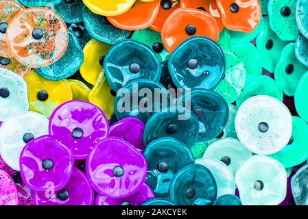 Background of glass petals.Glass Flower . Decoration Background.Multicolored glass round flower petals. Stock Photo