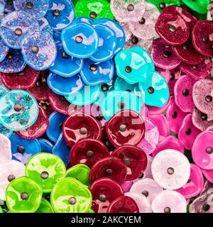 Background of glass petals.Glass Flower . Decoration Background.Multicolored glass round flower petals. Stock Photo