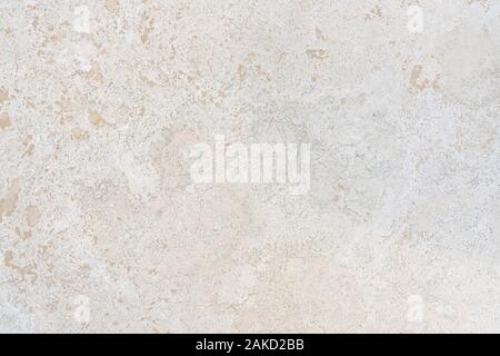 Beige limestone similar to marble natural surface for bathroom or kitchen countertop. High resolution texture and pattern. Stock Photo