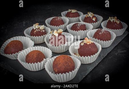 home made cake chocolate potatoes on black board Stock Photo