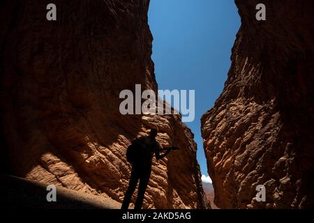 A man playing guitar at the Anphitheatre at Devil's Gorge, on the Salta-Cafayate road, Argentina Stock Photo