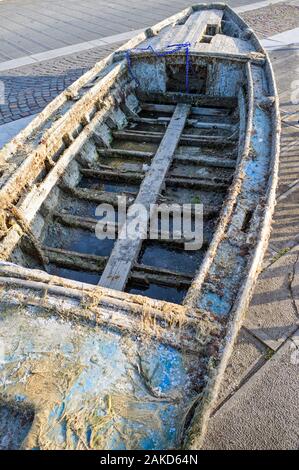 sunken boat recovered from the sea Stock Photo