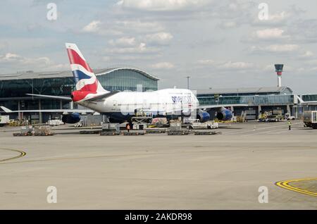 London, UK - May 22, 2019: A British Airways Jumbo Jet - Boeing 747, parked at Terminal 5 of London Heathrow Airport on a sunny summer day. Stock Photo