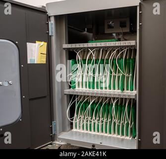 Steel storage cabinet of iPad tablets charging for grade school classroom use Stock Photo