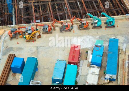 Heavy machinery and containers at a construction site. Very high angle view. Stock Photo