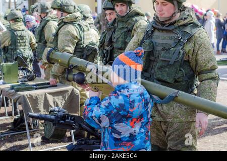 Slantsy, Leningrad region, Russia, July 30, 2016: child holding anti-tank rocket propelled grenade launcher Stock Photo