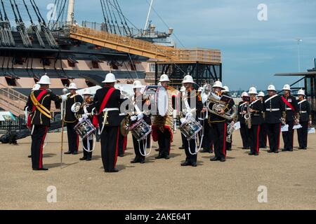 Royal Marines Band Service. D-Day reenactment event day, Portsmouth Historic Dockyard, England. Horizontal format. Copy space. Sunny Day & live music. Stock Photo