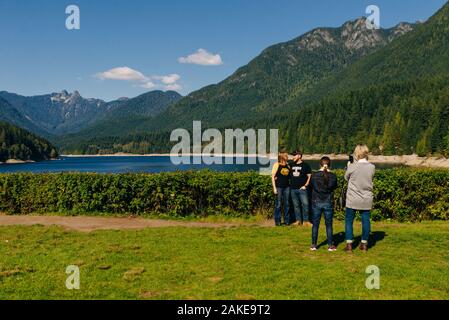 British Columbia, Canada - september, 2019 - Capilano River and the lions mountain with tourists Stock Photo