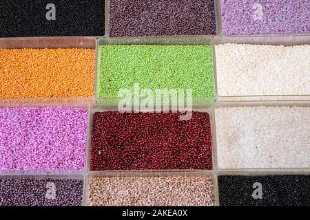 Beans in boxes multi-colored of different sizes and styles sold n local market in Greece Stock Photo