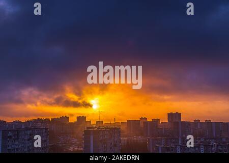 Morning sunrise over the city residential houses Stock Photo