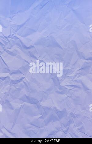 Purple crumpled wrinkled textured paper background. Copy space Stock Photo