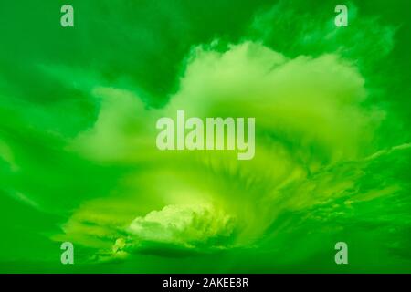 Cloudy green stormy dramatic sky. Thunder cloudscape. Meteorology Stock Photo