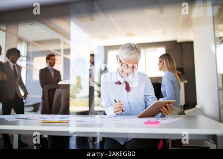 Portrait of architects having discussion in office Stock Photo