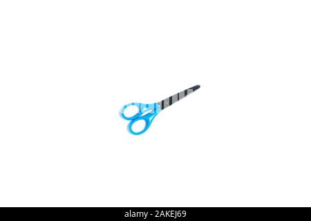 School scissors with blue handles on white isolated background. Central composition. Flat lay, top view, copy space. Stock Photo