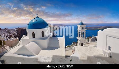 Traditional blue domed Greek Orthodox church of Imerovigli, Island of Thira, Santorini, Greece. Stock Photo