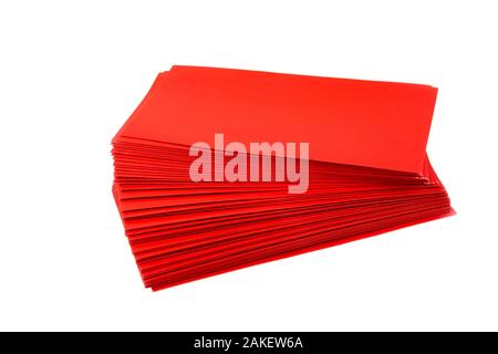 Stacked red empty envelopes on white background, The concept Ang Pao or Chin Sok of Chinese New Year Stock Photo