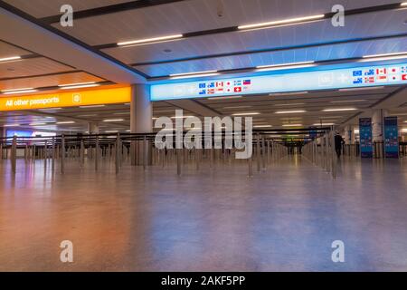 Immigration passport and border control reception area, queueing / queue control barriers, and UK border force gates, at North terminal, Gatwick Airport. London. UK. (115) Stock Photo