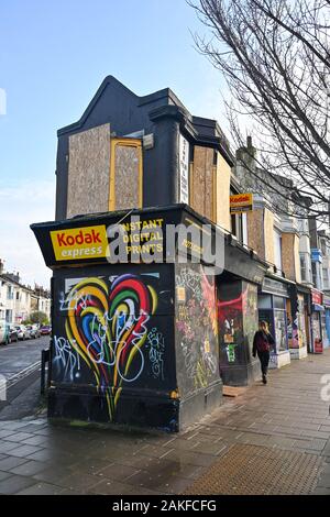 The old Kodak Express camera and photographic printing shop in Brighton which is now being used to house the homeless  UK Stock Photo