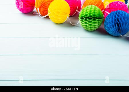Festive background with colorful paper balls. Stock Photo