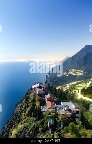 The Sanctuary of Montecastello rises on a spike of rock overlooking Lake Garda. Tignale, Brescia province, Lombardy, Italy, Europe. Stock Photo