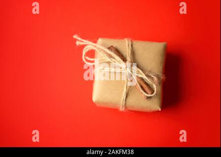 Gift Box In Craft Paper With Christmas Decoration Twine Rope
