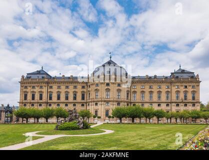 South wing of Baroque Wurzburg Residence (Wurzburger Residenz), the UNESCO World Heritage Site in Franconia, northern Bavaria, Germany, with garden sc Stock Photo