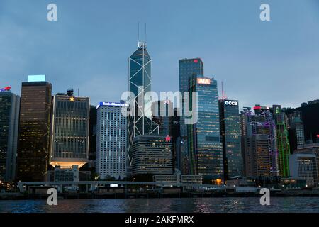 Close-up evening view of the Central Business District of Hong Kong from Victoria Harbour Stock Photo