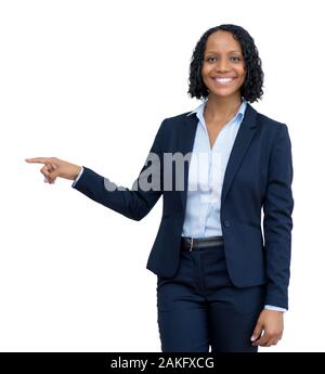 African american businesswoman pointing sideways isolated on white background for cut out Stock Photo