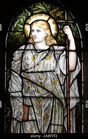 Stained Glass Window depicting Faith - one of the three theological virtues Stock Photo