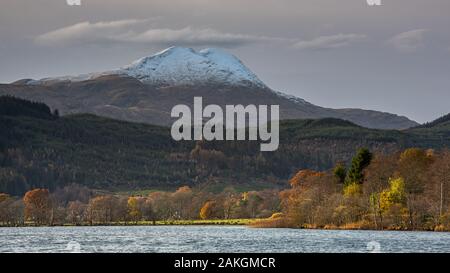 Looking across Loch Ard in the Scottish Highlands to the snowy summit of Ben Lomond Stock Photo