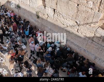 DEC 2019 - group of women praying at the women's side of the Wailing Wall in Old Jerusalem israel Stock Photo