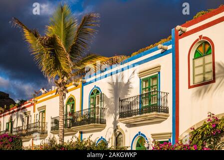 Spain, Canary Islands, Gran Canaria Island, Puerto de Mogan, port buildings and palms Stock Photo