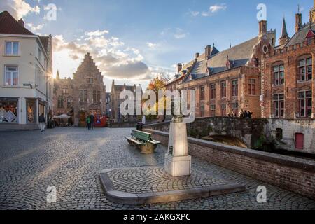 Belgium, Western Flanders, Bruges, historical centre listed as World Heritage by UNESCO, back wall of the Brugse Vrije or the Franc de Bruges Palace and statue of Frank Van Acker Stock Photo