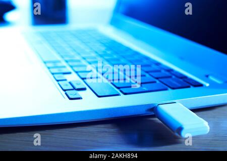 Data Being Illegally Downloaded From Computer Onto Memory Stick Stock Photo