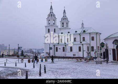 Minsk, Belarus - November 26, 2019: NemigaTrinity Suburb. The cathedral of Holy Spirit in the snow. Stock Photo