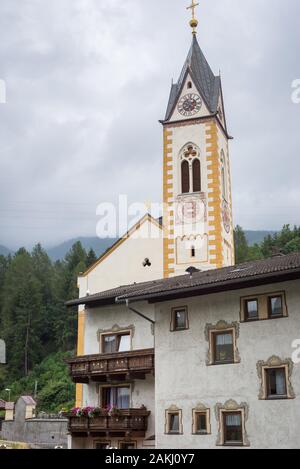 Scenic catholic church named 'St. Peter und Paul' in the town of Muhlbachl, Austria Stock Photo