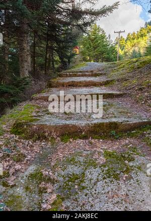 Beautiful stone pavement near mountainous church of Assumption of Mary, Arcadia, Greece Stock Photo