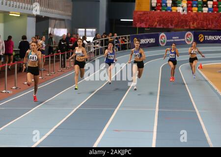 ISTANBUL, TURKEY - DECEMBER 29, 2019: Athletes running during Turkish Athletic Federation Indoor Athletics Record Attempt Races Stock Photo