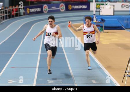 ISTANBUL, TURKEY - DECEMBER 29, 2019: Athletes running during Turkish Athletic Federation Indoor Athletics Record Attempt Races Stock Photo