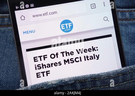 ETF website displayed on smartphone hidden in jeans pocket Stock Photo