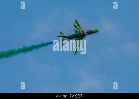 Saudi Hawks: BAE Hawk T1A aircraft of the Royal Saudi Arabian Air Force flying display team in action Stock Photo