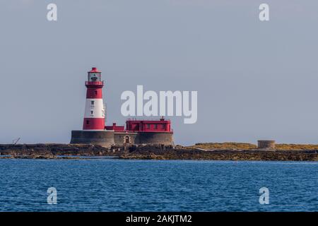 Longstone Lighthouse in the Outer Farne Island of Longstone.  Built in 1826 and still an active light house. Stock Photo