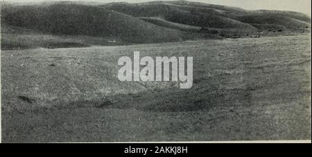 Southern Africa, the land and its peoples . Photo.] Windhoek. [S.A.R. Publicity Department.. Photo.] The Namib. [S.A.H. Publicity Department. thi: IKii i ECTORATES 199 lip. The Schwarz scheme aimed at reconstituting all these lakes and rivers by diverting southwards part of the Cunene andZambezi waters.Throughoul Bechuanaland subterranean water is abundant, but the water-table is sometimes over  !&lt;)() feet below the surface.To obtain Water &lt;ven in the river courses deep boring is often necessary. There i^ no doubt, however, that, it bonngs wen made of such depth as to aoid the brackish Stock Photo