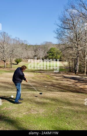 Golf is a game that most folks can play well into retirement. Smaller, local courses usually offer an affordable way to get out and exercise. Stock Photo