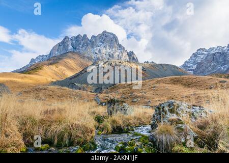 dramatic mountain landscape in Juta trekking area landscape with snowy  mountains in sunny autumn day -  popular trekking  in the Caucasus mountains, Stock Photo