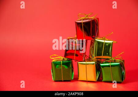 stack of gift box on red background Stock Photo